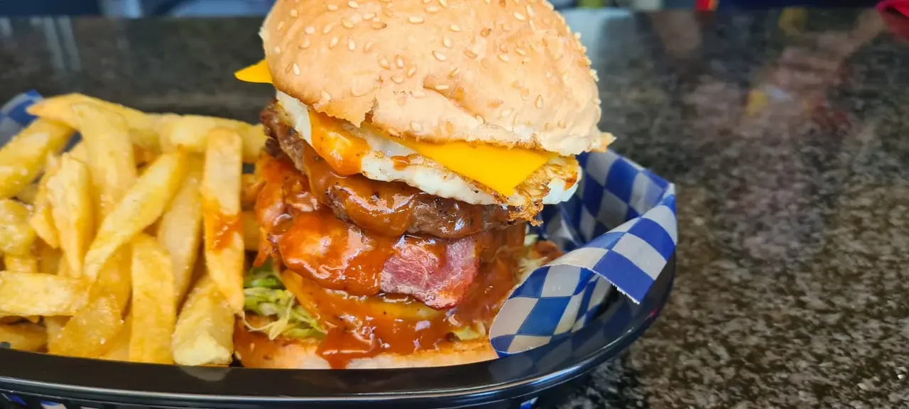 Bacon egg burger and chips